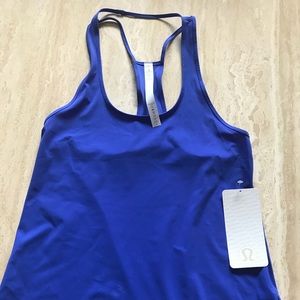 Lululemon workout tank never worn with tag.